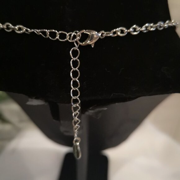 Aldo Ladies 1/4 Moon Shape Metal Necklace Silver Tone - Picture 2 of 2